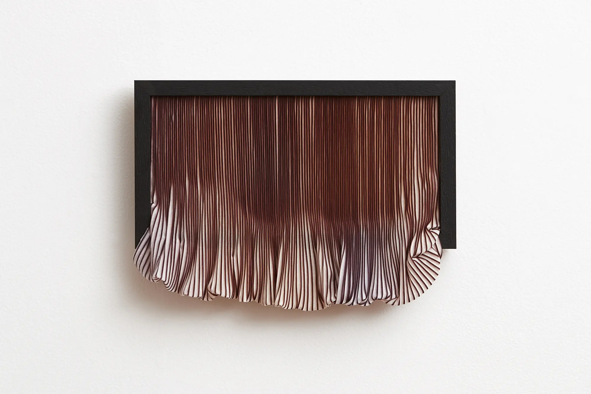 Stevie-Fieldsend_hereafter-xiv_2018_paper-pleated-polyester-textile-on-canvas-Tasmanian-Oak_24-x-33-x-4cm.-Photograph-by-Zan-Wimberley
